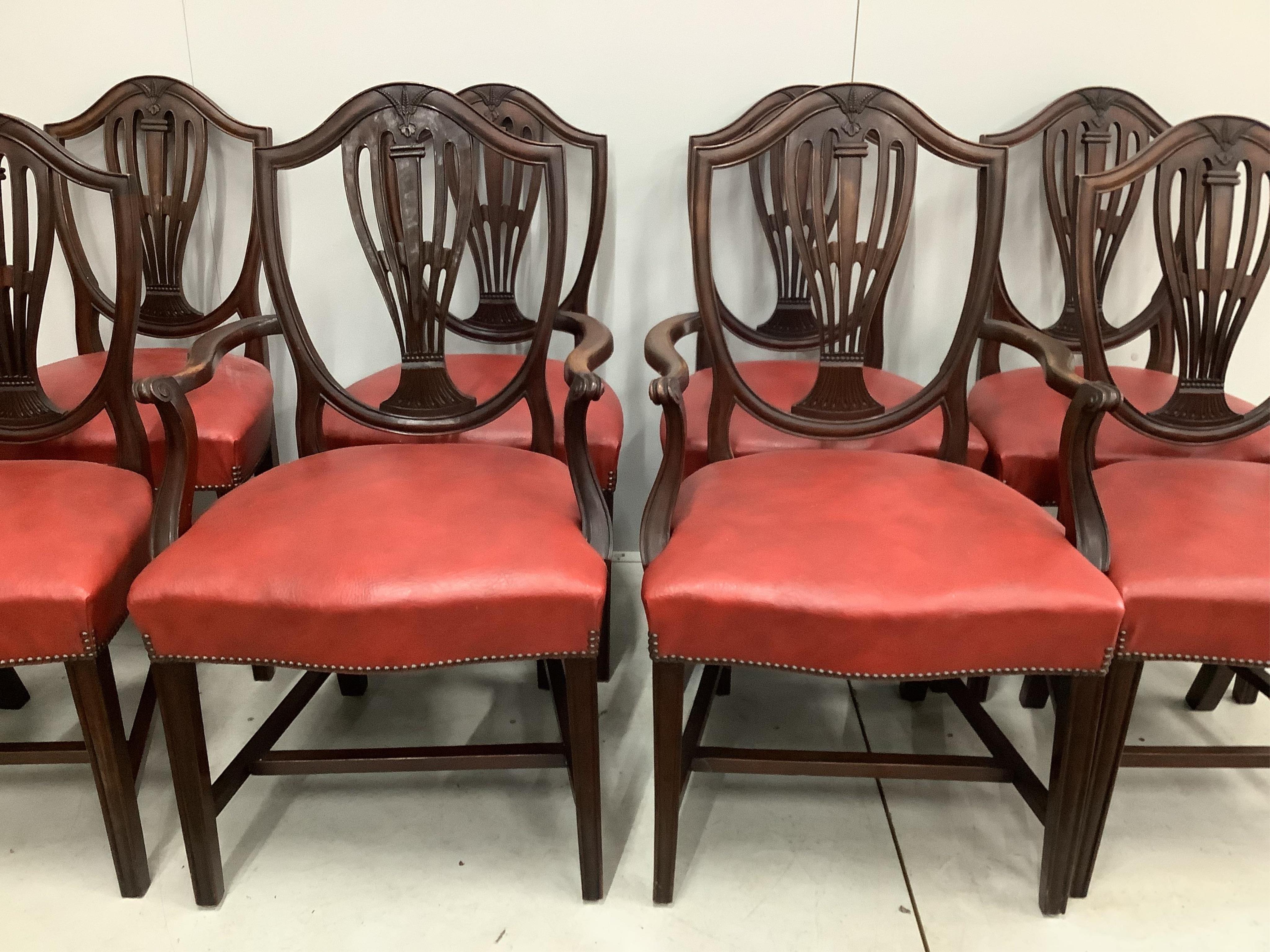 A set of eight Edwardian Hepplewhite style mahogany dining chairs, including two carvers. Condition - a little dull in finish but otherwise fair